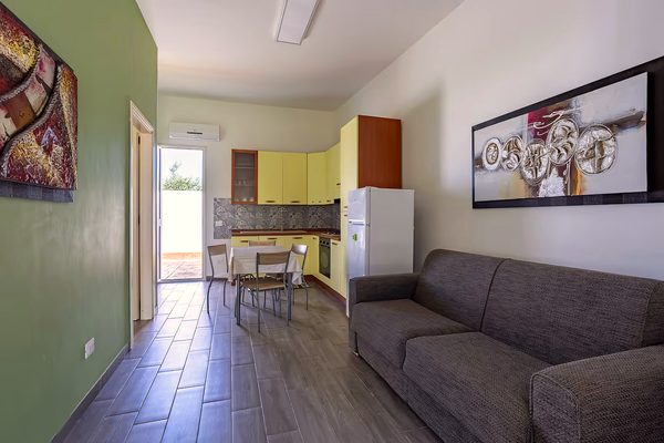 La zona giorno con divano letto